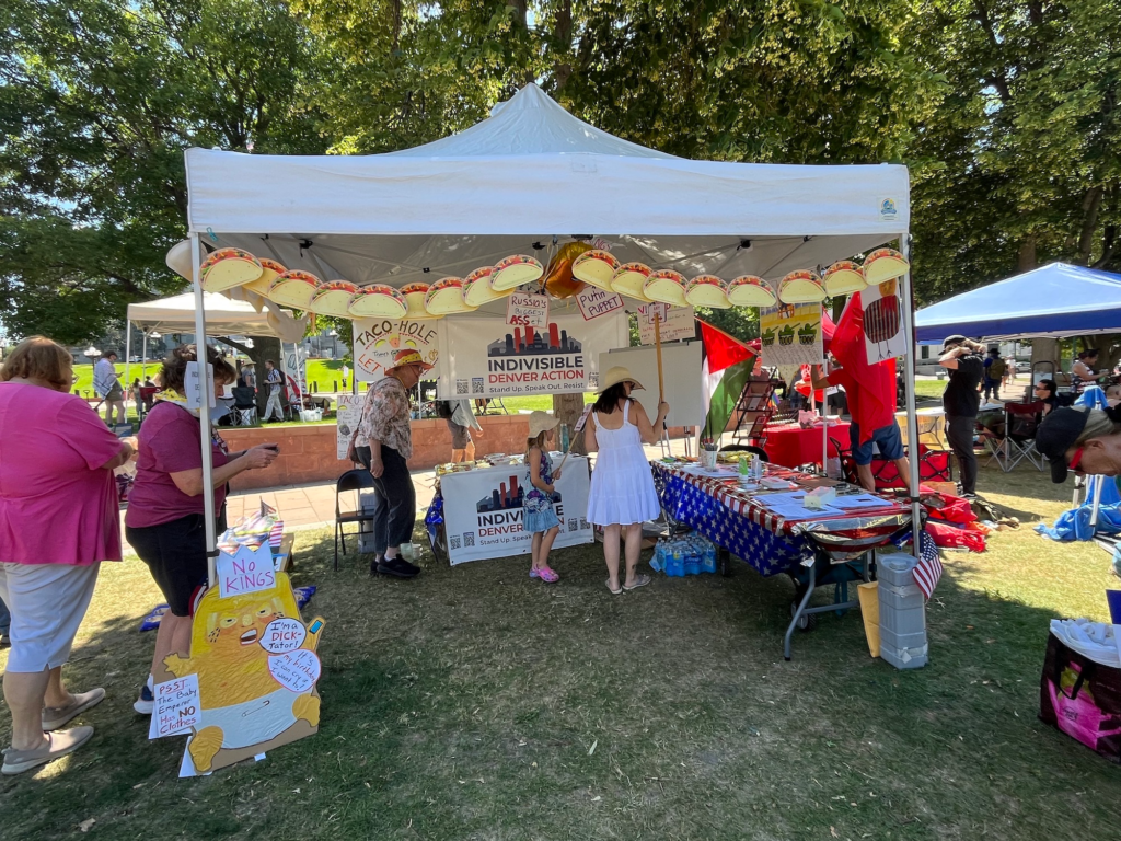 IMG_2499 Indivisible Denver Action volunteer booth at No Kings Rally